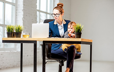 women working with carrying kid